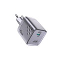 Silver travel adapter with multiple ports on a white background